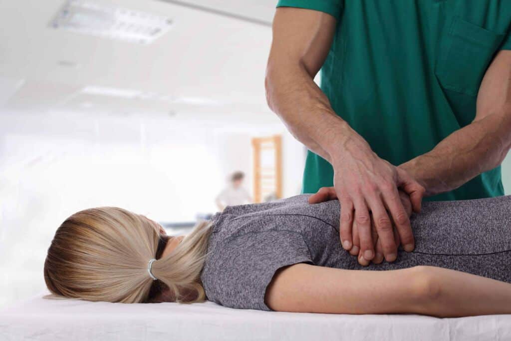 Chiropractor Walnut Creek CA — patient consultation near Rossmoor at Elite Chiropractic Rehab and Wellness